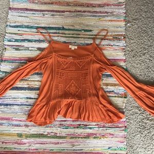 Orange flowy top